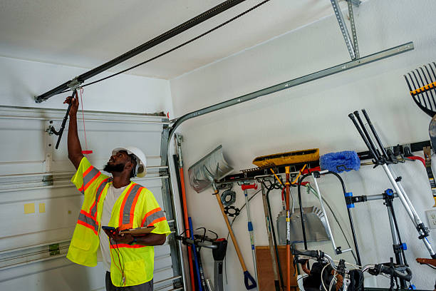 Professional Garage Door Panel Replacement technician working in Tonawanda, NY